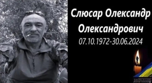 В Бериславе проводили в последний путь земляка, погибшего летом прошлого года